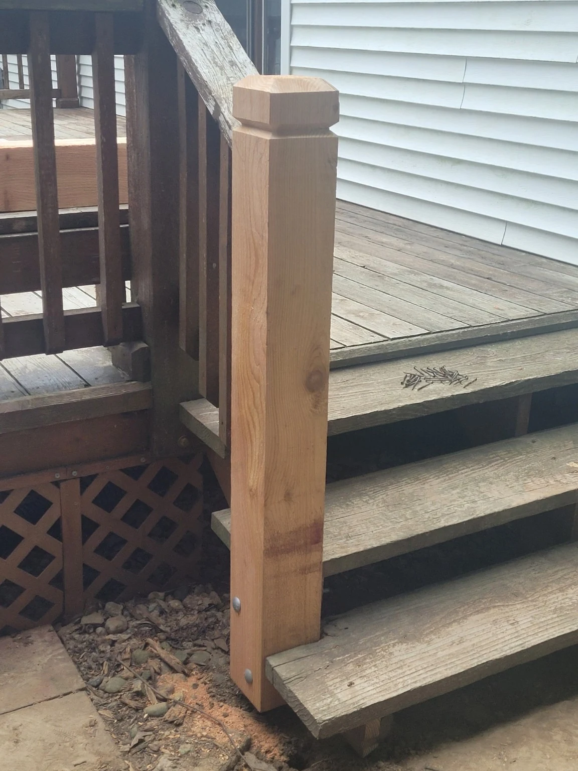 New 6 by 6 deck support post shaped to match the existing design