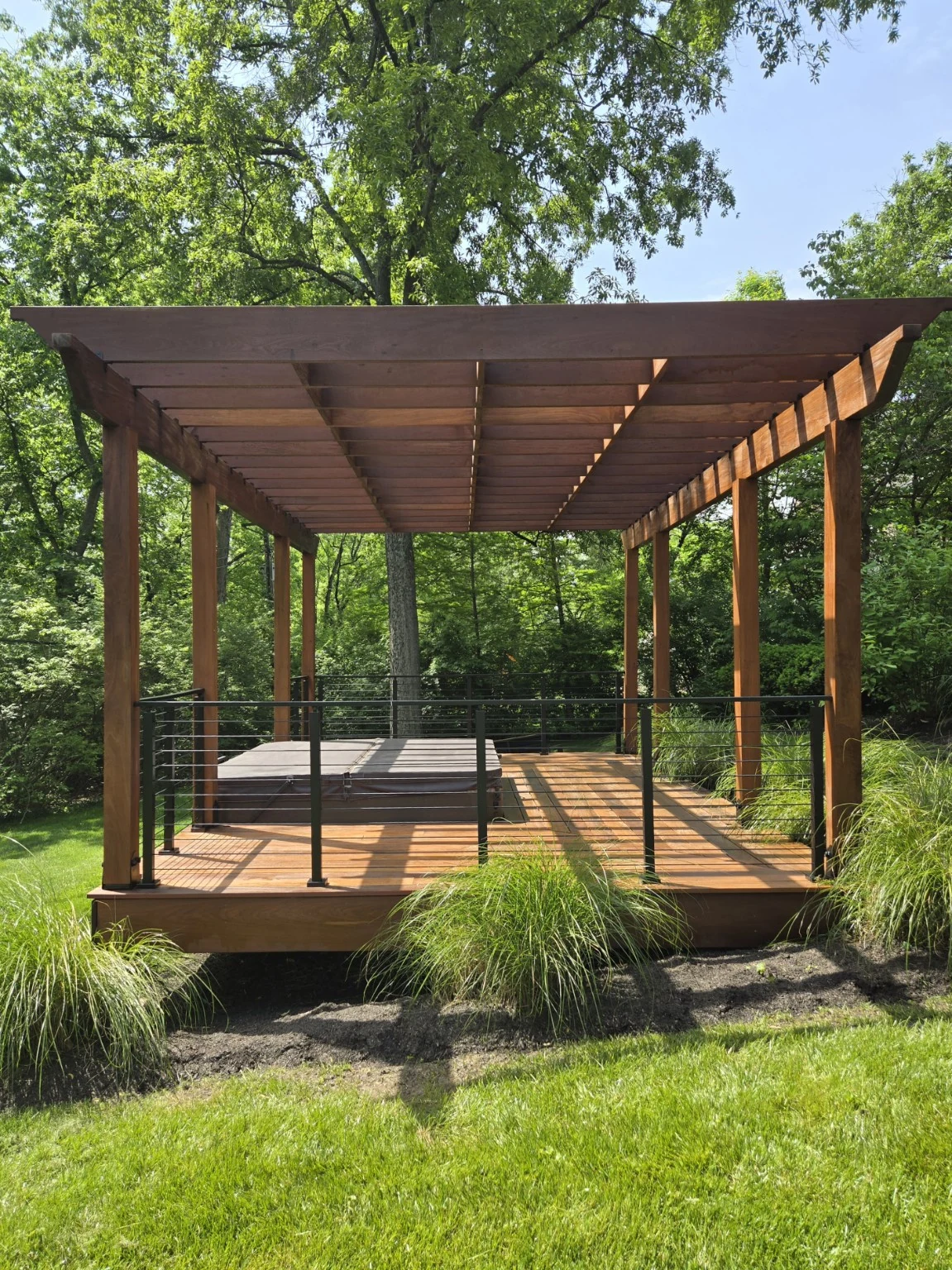 Straight-on view of finished Ipe trellis and deck
