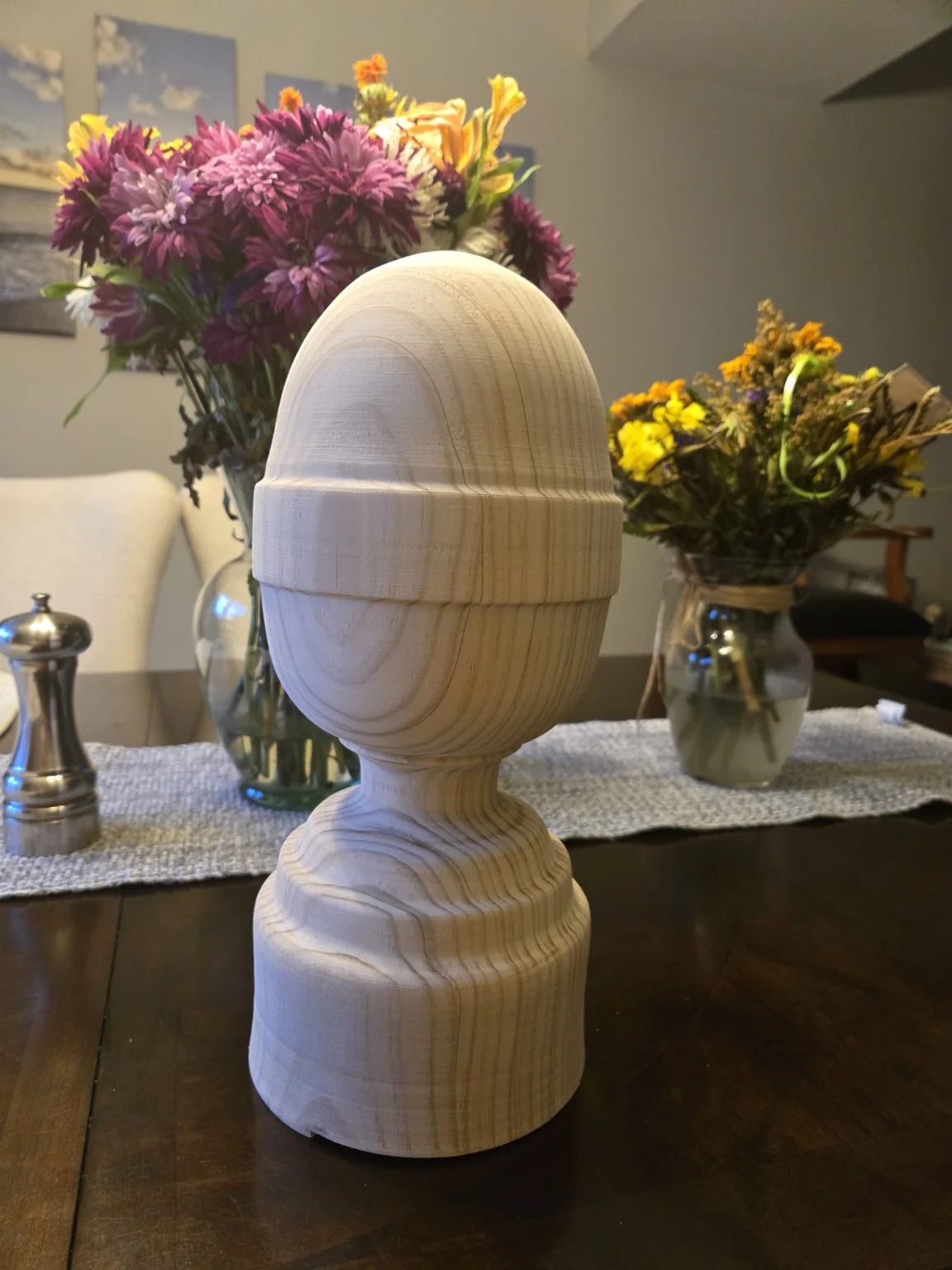 Completed solid-wood finial before being split for installation on the pediment