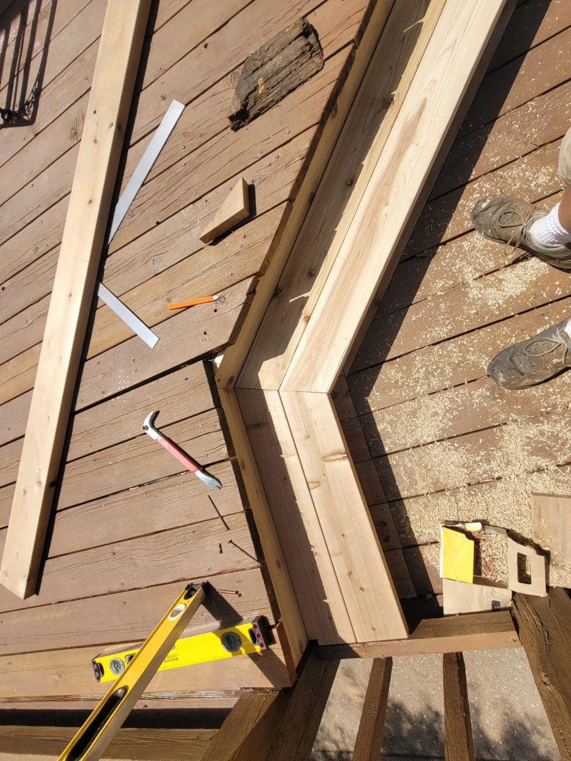 Close view of fitted angled framing joint for wraparound step
